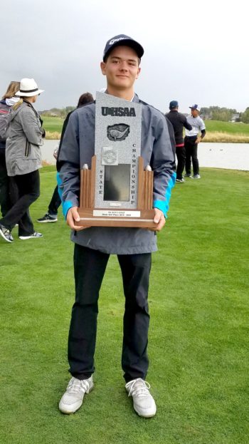 jarom golf with trophy for 2nd place state